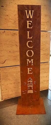 Schild Welcome Leuchtturm Welle